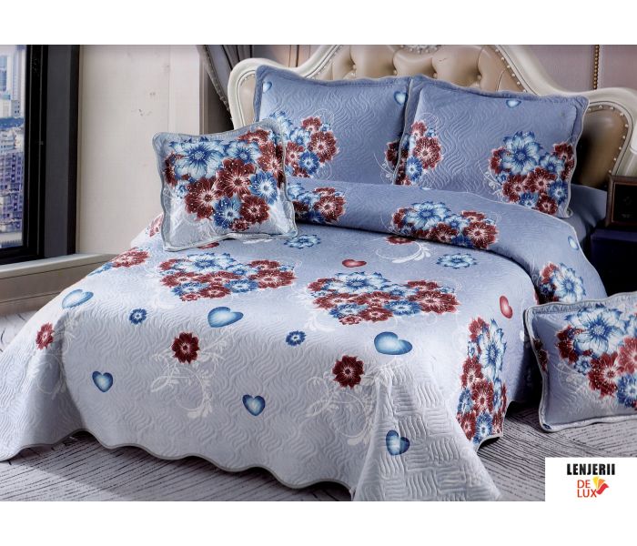 Cuvertura matlasata pentru pat bleu cu flori formata din 5 piese 